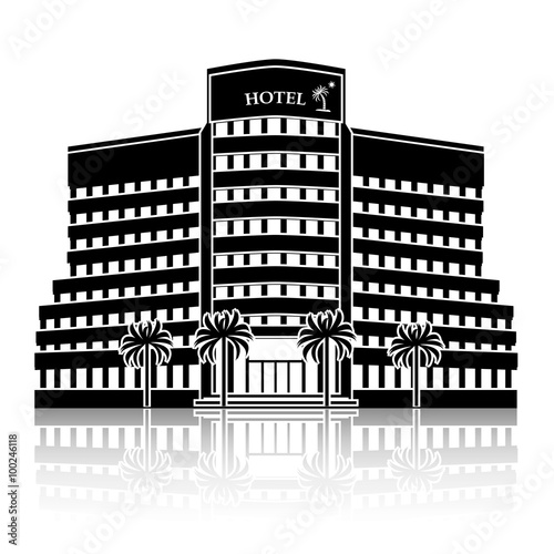 silhouette hotel building with palm trees and reflection