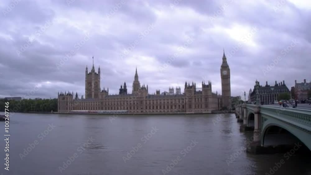 LONDON - OCTOBER 11: Pan across Westminster palace to unidentified people on Westminster bridge on October 11, 2011 in London LONDON - OCTOBER 11: Pan across Westminster palace to unidentified people on Westminster bridge on October 11, 2011 in London