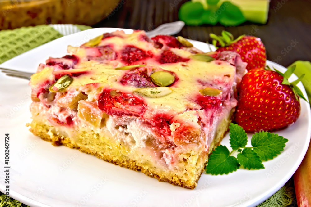 Pie strawberry-rhubarb with sour cream on napkin Pie strawberry-rhubarb with sour cream on napkin