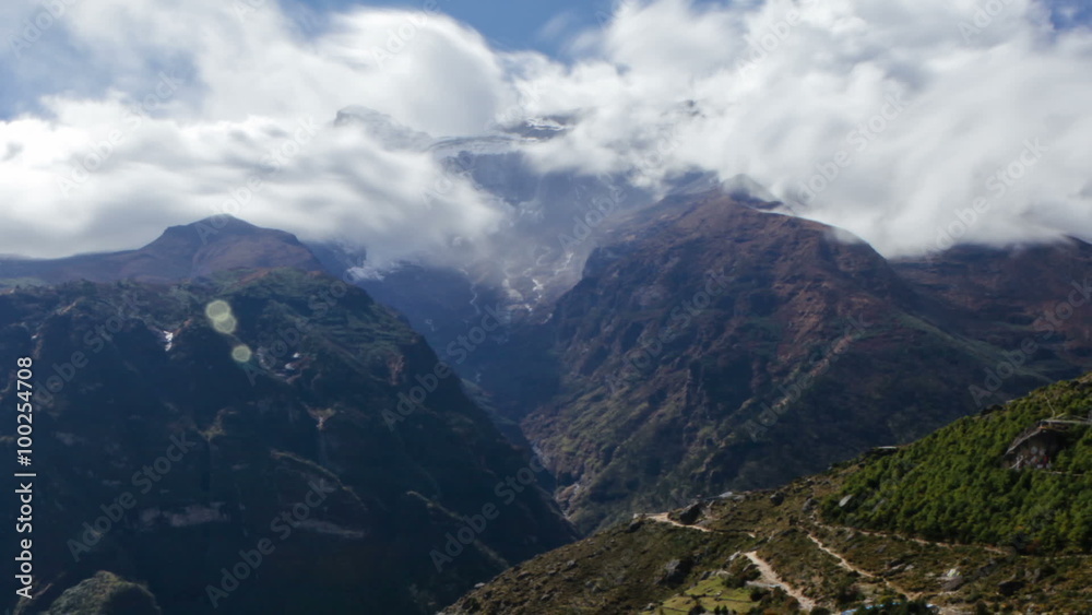 Panning shot of Time-lapse of a colorful village on a Himalayan mountainside. Panning shot of Time-lapse of a colorful village on a Himalayan mountainside.