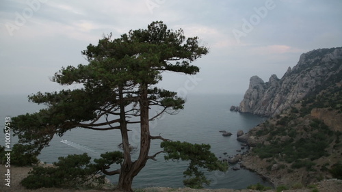 Tourist boat floats of Tsar Bay, New World, Crimea photo