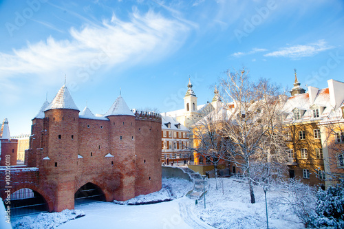 Warsaw Barbacan fortress (castle) in winter is in the capital city of Poland. Old town is the historic center of Warsaw