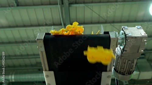 Plastic Parts of Toys Falling from Conveyor Belt
