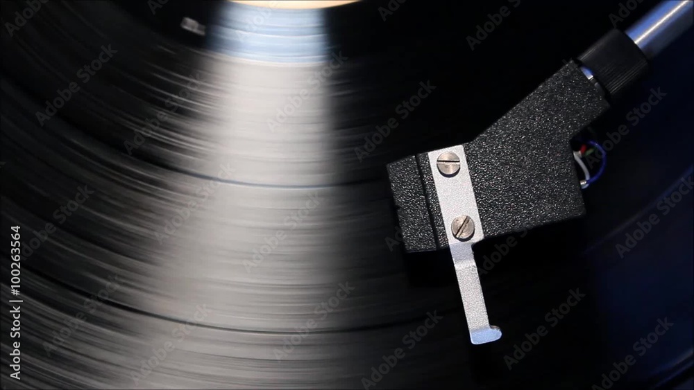 Record player retro turntable HD. Top shot close-up of a spinning vinyl.