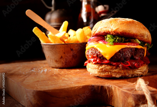 Modern Fast Food homemade burger with chips photo