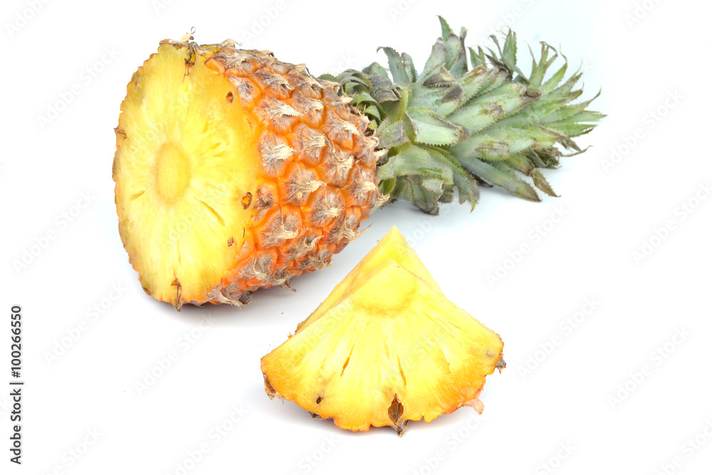 Pineapple and its slices on a white background Pineapple and its slices on a white background