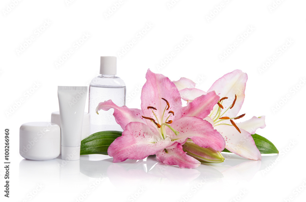 cosmetic set for skin care on a white background with flowers li