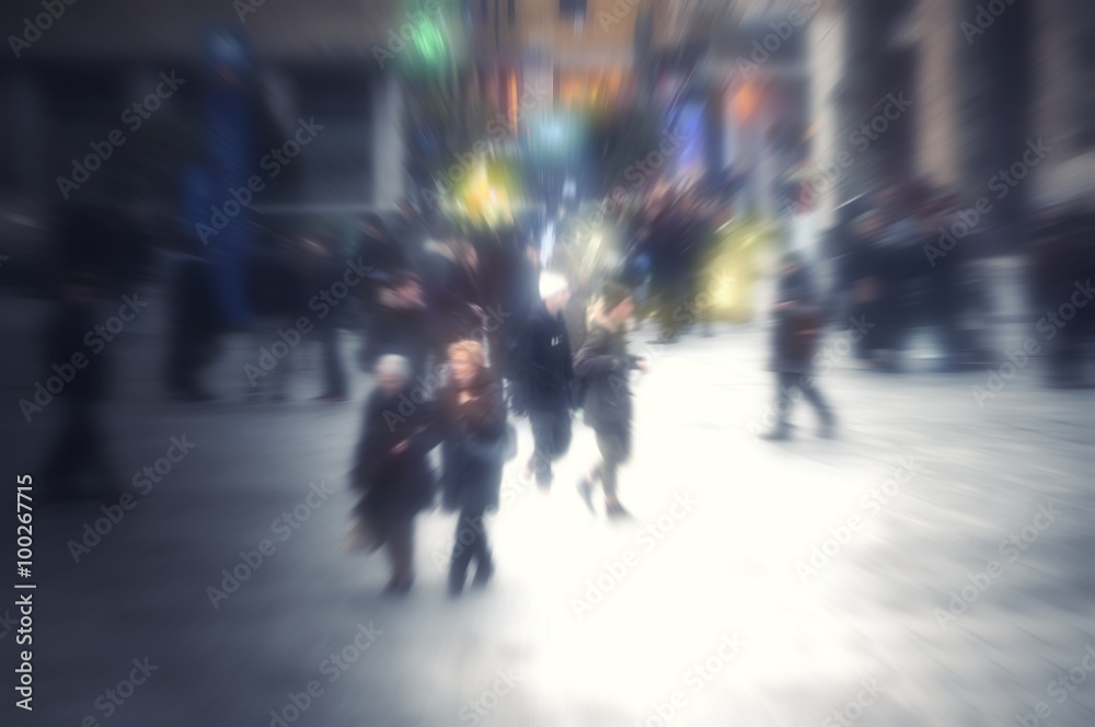 Abstract blurred people walking in shopping centre
