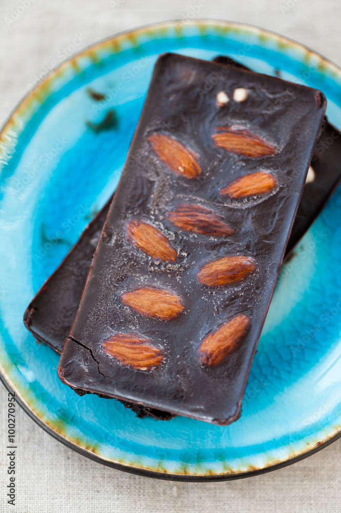 Raw vegan chocolate with almonds Raw vegan chocolate with almonds