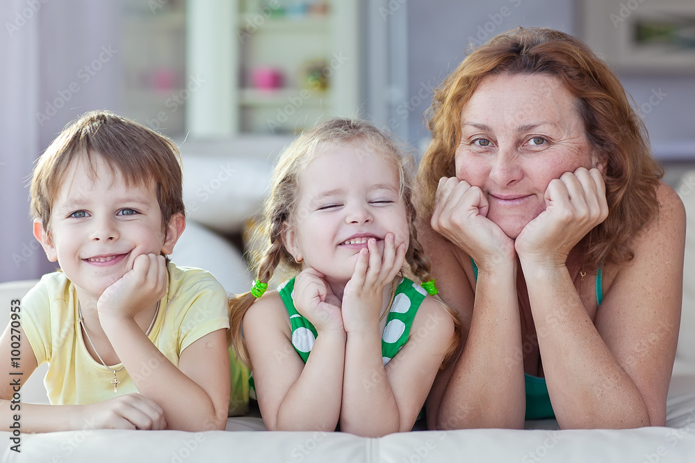 Grandmother are playing with kids at home Grandmother are playing with kids at home