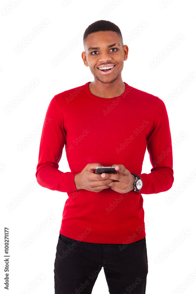 African American young man sending a text message on her smartph