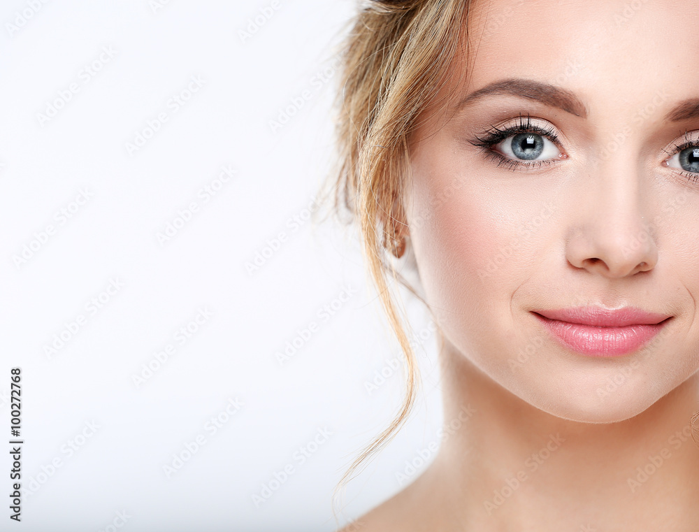 Obraz premium Portrait of beautiful woman on white background