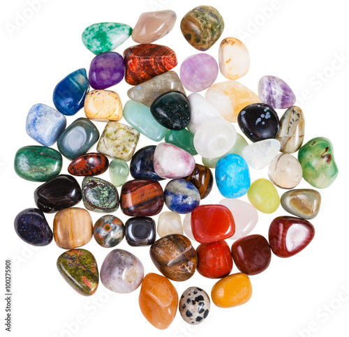 top view of various gemstones on white background