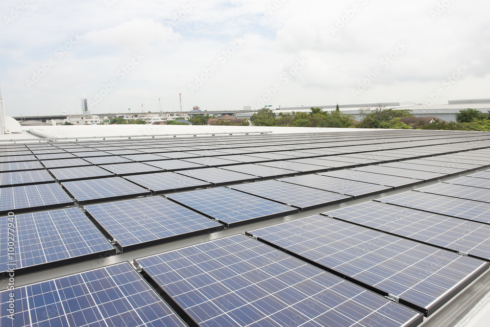 Power plant using renewable solar energy with blue sky with clou Power plant using renewable solar energy with blue sky with clou