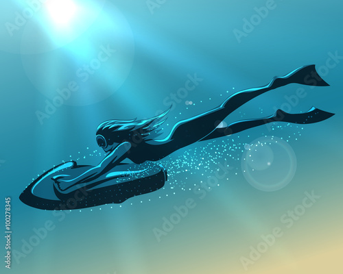Girl driving underwater scooter