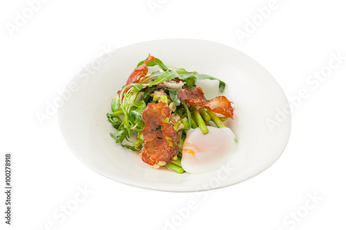 Vegetables salad with balsamic vinegar dressing, onsen tamago (Japanese style scald egg) and smoked striploin ham 1.5 millimeters thickness in ceramic bowl, a modern cusine concept food