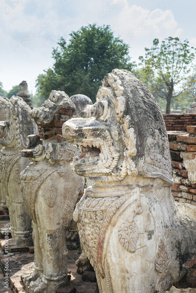 Statue lion style cambodia around pagoda ruins. In Statue lion style cambodia around pagoda ruins. In