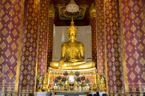 Golden color The crowned Buddha in the ubosot at Wat Naphrameru