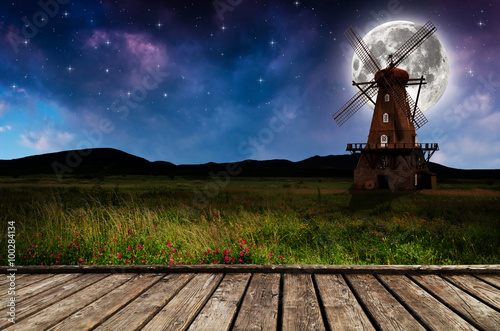Wallpaper Mural Windmill in the night. Elements of this image furnished by NASA.