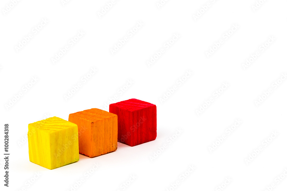 Three colored cubes isolated on white background