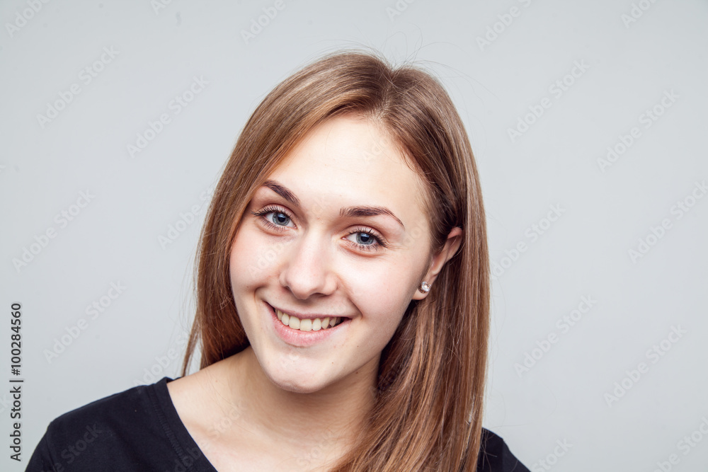 Attractive woman with black t-shirt isolated on a over white background Attractive woman with black t-shirt isolated on a over white background