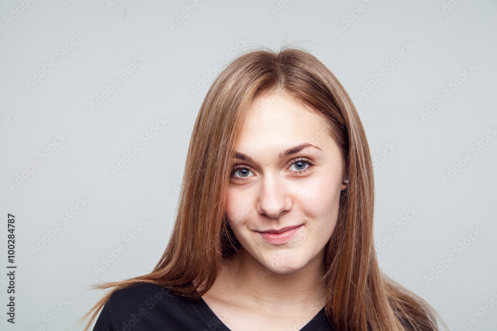 Attractive woman with black t-shirt isolated on a over white background Attractive woman with black t-shirt isolated on a over white background
