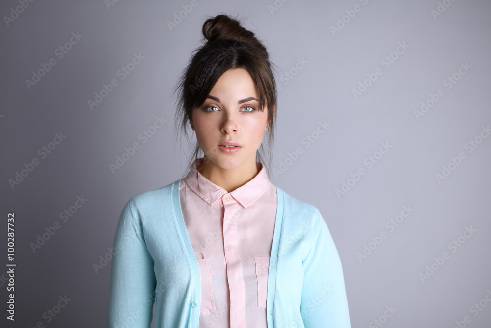 Portrait of an attractive fashionable young brunette woman Portrait of an attractive fashionable young brunette woman