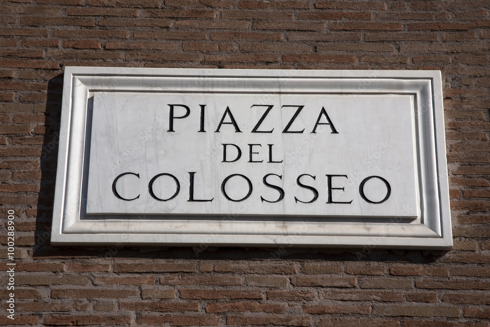 Colosseum Square Sign on Brick Wall in Rome, Italy Colosseum Square Sign on Brick Wall in Rome, Italy