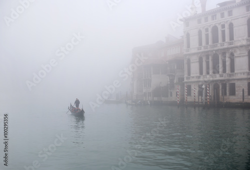 Lonely gondola in a fog, Venice
