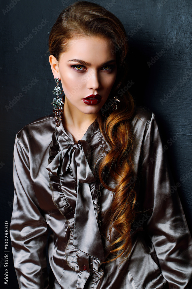 gorgeous woman with long dark curly hair wears elegant dress and bijou gorgeous woman with long dark curly hair wears elegant dress and bijou