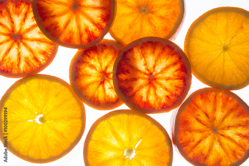 Blood orange slices with backlight (top view) Blood orange slices with backlight (top view)