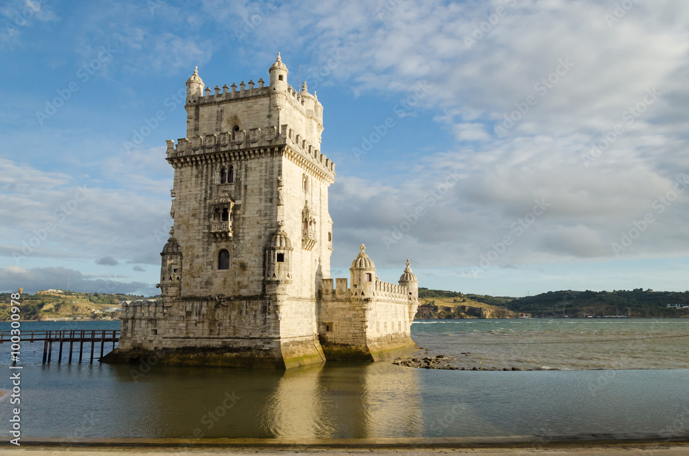 rear view of the belem tower at sunset, symbol of lisbon