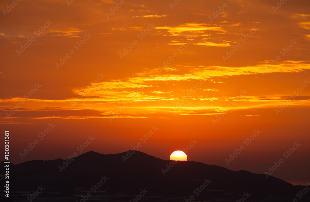 Part sunrise over mountains