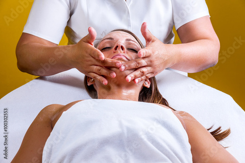 Face cleaning in a beauty salon. Beautician series.