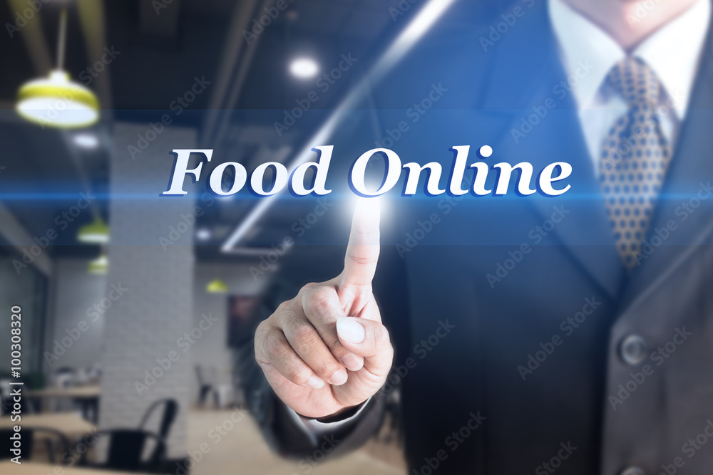 A Businessman holding a white sign with the message Food Online. Can bring to the medium of your ad. A Businessman holding a white sign with the message Food Online. Can bring to the medium of your ad.