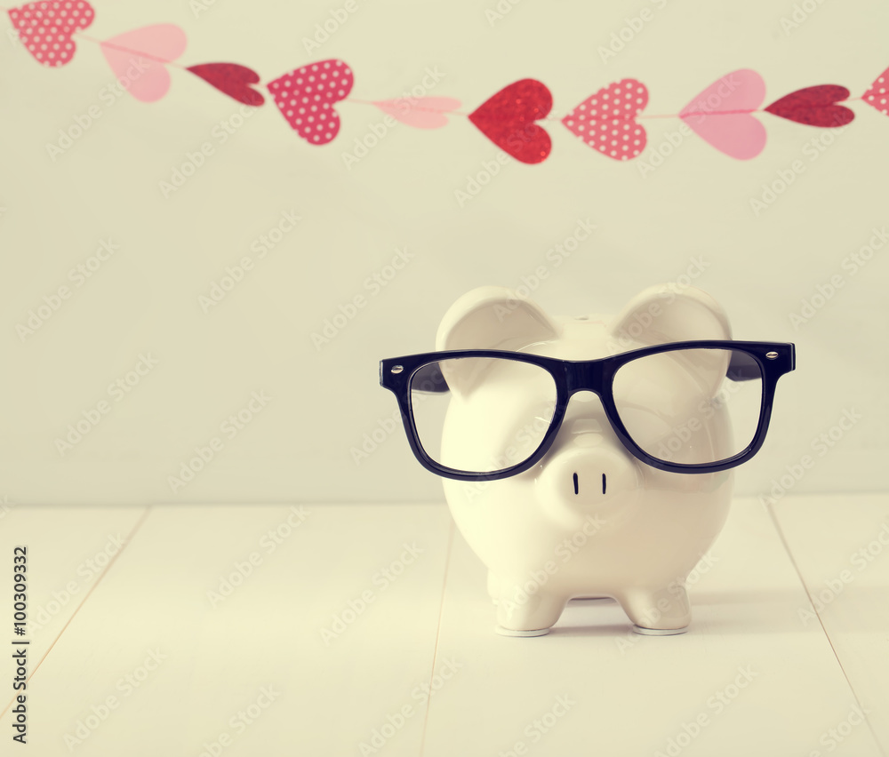 Piggy bank wearing black glasses Piggy bank wearing black glasses