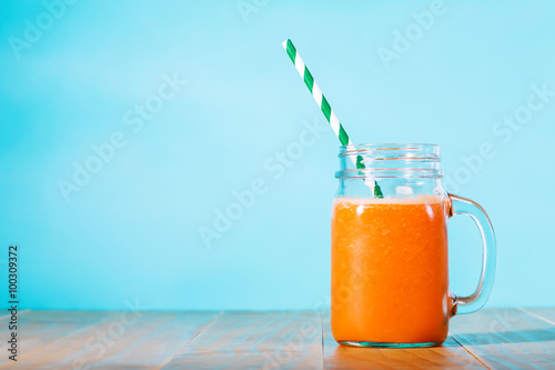 Carrot juice in masons jar