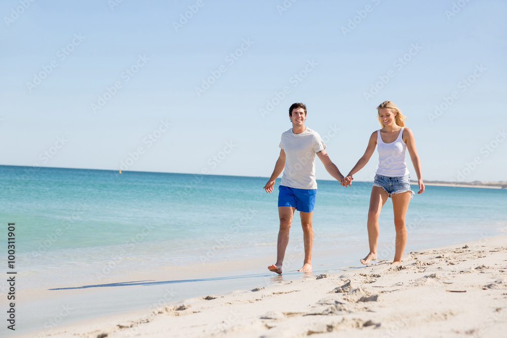 Romantic young couple on the beach