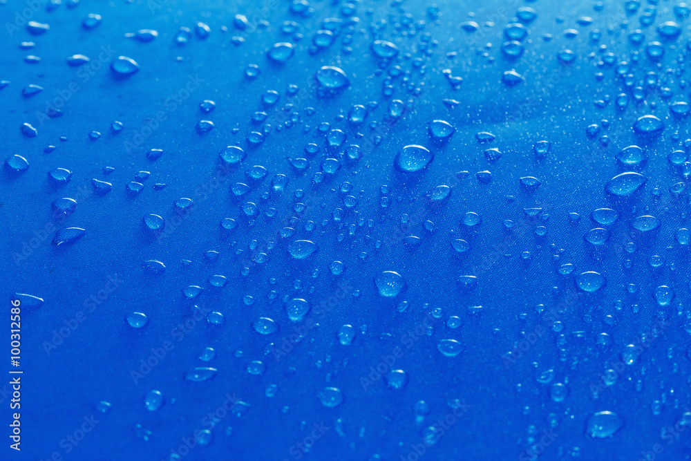 Rain Water droplets on blue fiber