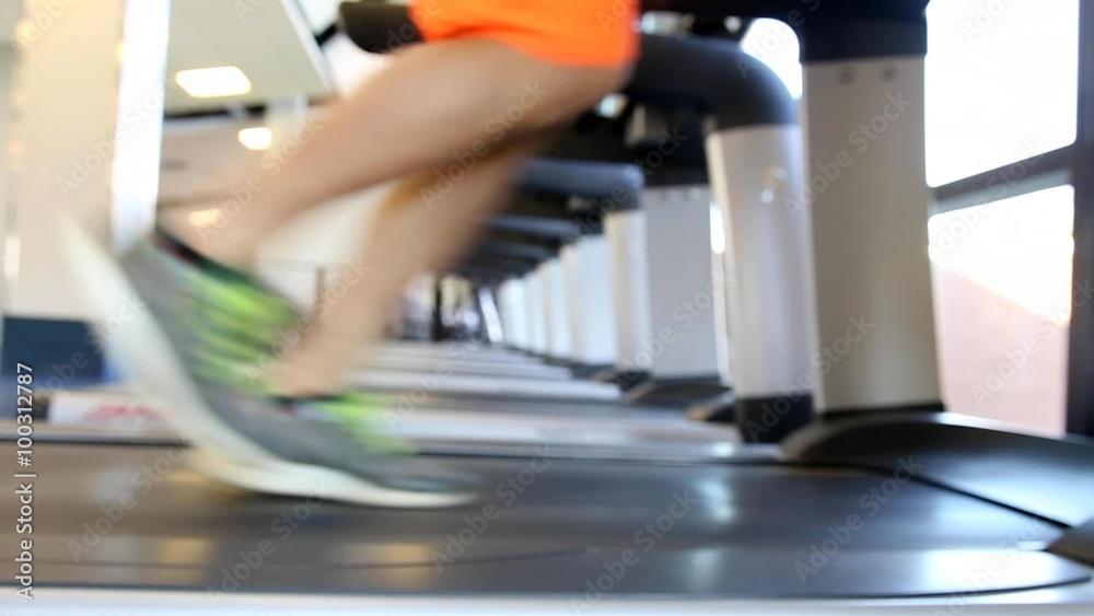 Closeup of person running on treadmill Closeup of person running on treadmill