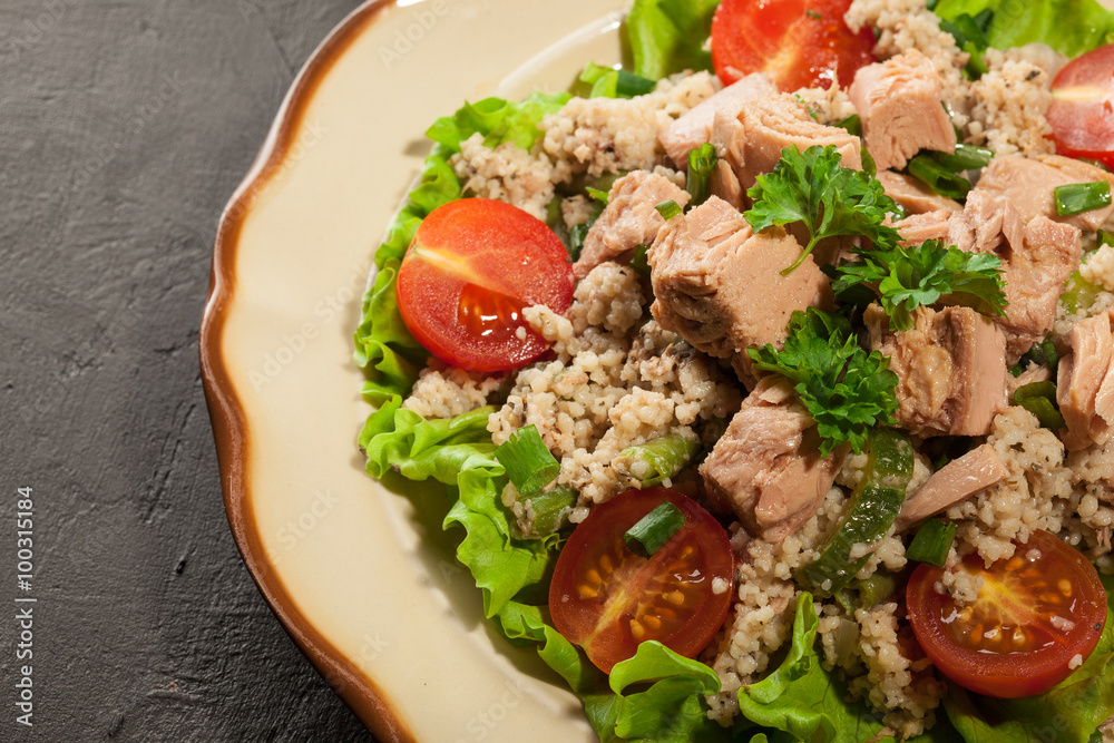 Tasty salad with couscous, tuna and vegetables Tasty salad with couscous, tuna and vegetables