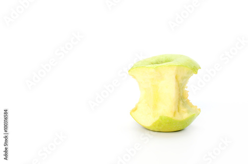 green apple core on a white background photo