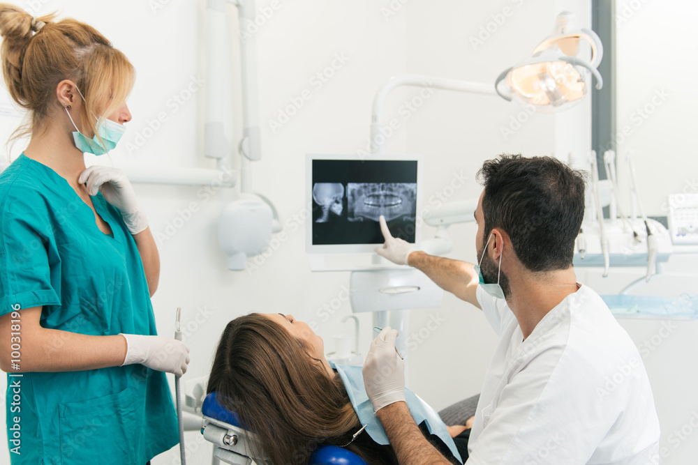 doctor and the assistant during a surgery - Stock image doctor and the assistant during a surgery - Stock image