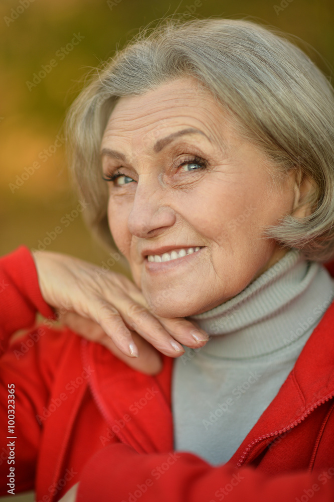 senior woman in  autumn park