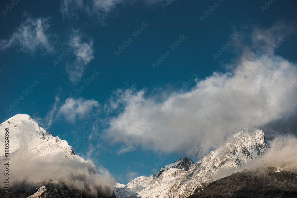 High mountain peak  and blue sky, winter landscape