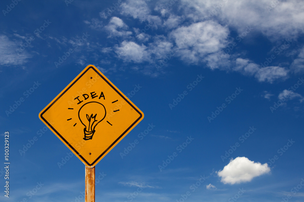 drawing of Idea icon on yellow traffic sign drawing of Idea icon on yellow traffic sign