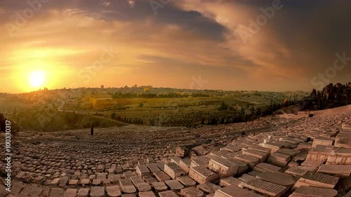 Jerusalem City in Israel, dynamic time-lapse from the Mount of Olives overlooking the cemetery towards the Dome of the Rock at sunset
