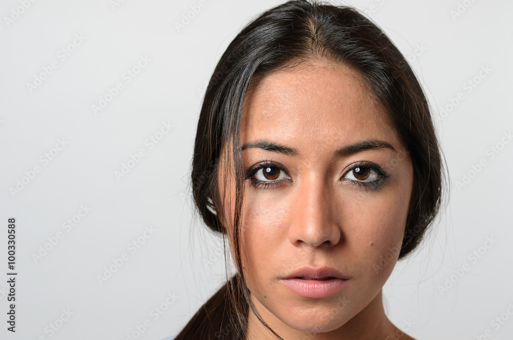 Woman with serious blank stare StockFoto Adobe Stock