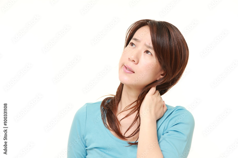 Japanese woman suffers from neck ache Japanese woman suffers from neck ache