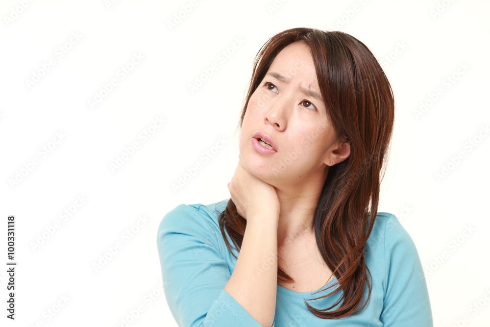 Japanese woman suffers from neck ache Japanese woman suffers from neck ache
